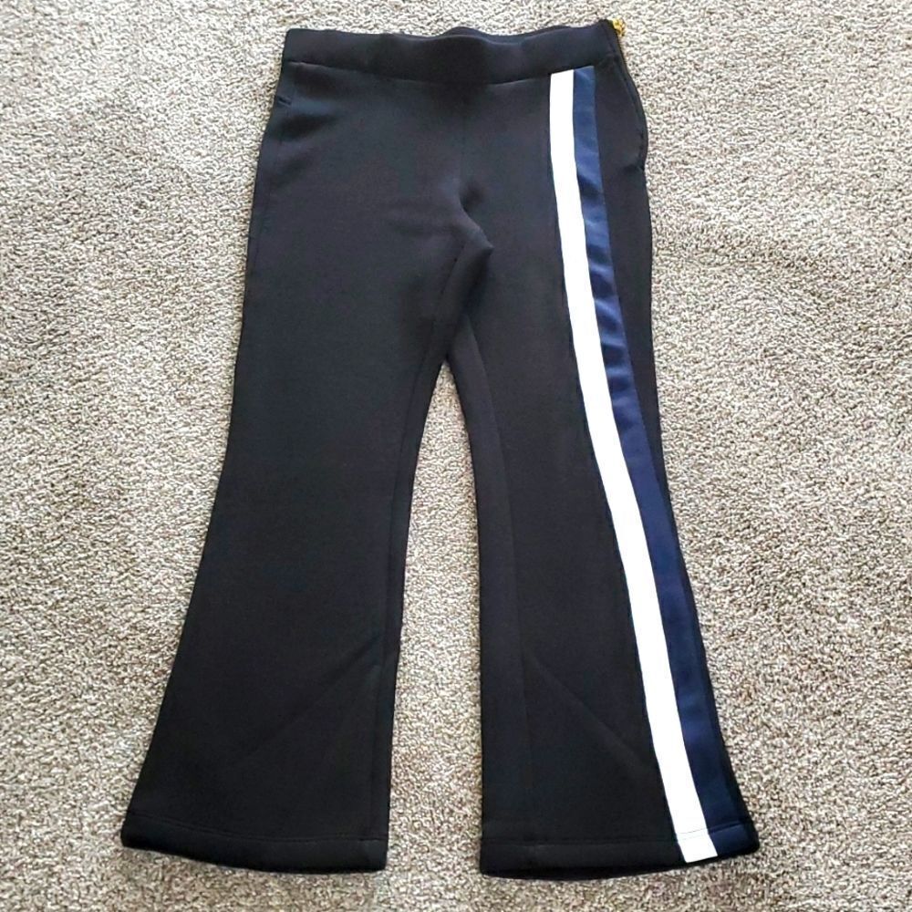 ROWLEY fitness pants, size medium. White and blue stripe on the side. Excellent.